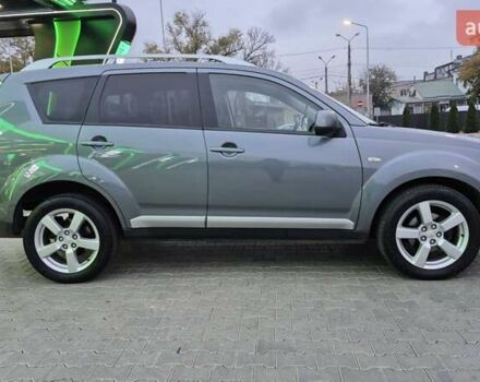 Серый Мицубиси Аутлендер ХЛ, объемом двигателя 2.2 л и пробегом 268 тыс. км за 8999 $, фото 4 на Automoto.ua