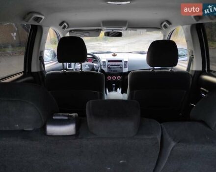 Серый Мицубиси Аутлендер ХЛ, объемом двигателя 2.4 л и пробегом 307 тыс. км за 8299 $, фото 41 на Automoto.ua