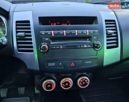 Серый Мицубиси Аутлендер ХЛ, объемом двигателя 2.2 л и пробегом 268 тыс. км за 8999 $, фото 40 на Automoto.ua