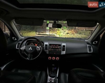 Серый Мицубиси Аутлендер ХЛ, объемом двигателя 3 л и пробегом 129 тыс. км за 10450 $, фото 29 на Automoto.ua