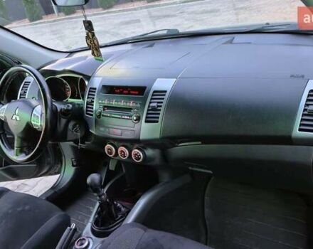 Серый Мицубиси Аутлендер ХЛ, объемом двигателя 2.2 л и пробегом 268 тыс. км за 8999 $, фото 90 на Automoto.ua