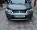 Серый Мицубиси Аутлендер ХЛ, объемом двигателя 2.36 л и пробегом 350 тыс. км за 8800 $, фото 1 на Automoto.ua