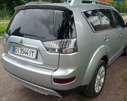 Серый Мицубиси Аутлендер ХЛ, объемом двигателя 2.4 л и пробегом 188 тыс. км за 9200 $, фото 24 на Automoto.ua