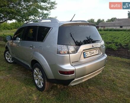 Серый Мицубиси Аутлендер ХЛ, объемом двигателя 2.4 л и пробегом 188 тыс. км за 9200 $, фото 4 на Automoto.ua