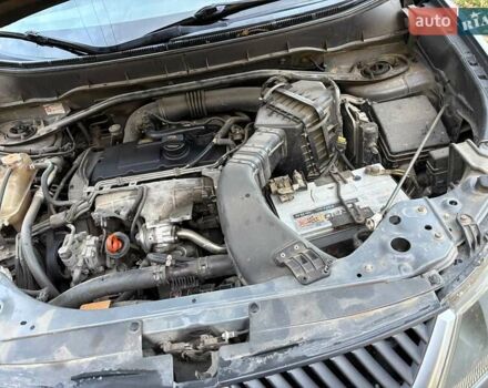 Серый Мицубиси Аутлендер ХЛ, объемом двигателя 2 л и пробегом 260 тыс. км за 8700 $, фото 7 на Automoto.ua