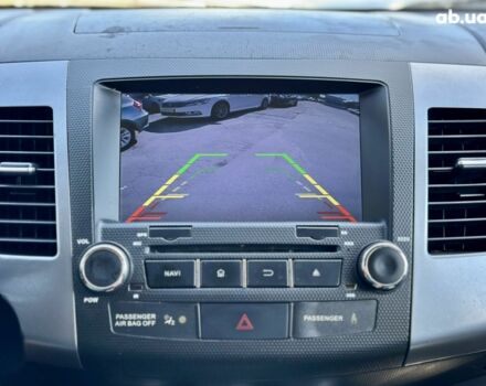 Серый Мицубиси Аутлендер ХЛ, объемом двигателя 3 л и пробегом 201 тыс. км за 8300 $, фото 12 на Automoto.ua