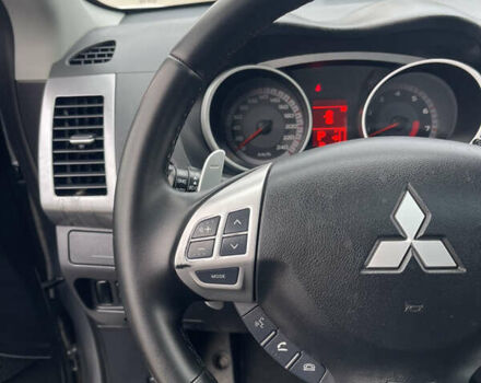 Серый Мицубиси Аутлендер ХЛ, объемом двигателя 2.36 л и пробегом 184 тыс. км за 8500 $, фото 11 на Automoto.ua