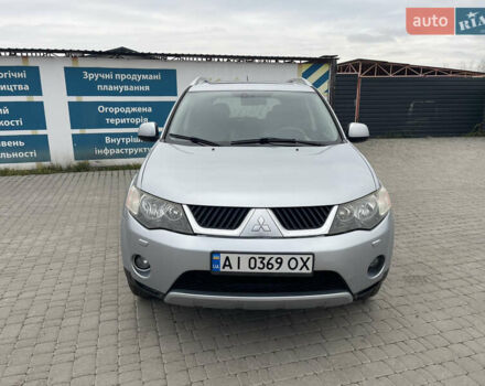 Серый Мицубиси Аутлендер ХЛ, объемом двигателя 2.36 л и пробегом 184 тыс. км за 8500 $, фото 1 на Automoto.ua
