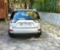 Серый Мицубиси Аутлендер ХЛ, объемом двигателя 2.36 л и пробегом 61 тыс. км за 9900 $, фото 1 на Automoto.ua