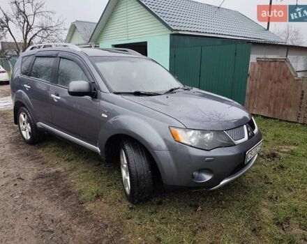Серый Мицубиси Аутлендер ХЛ, объемом двигателя 2.98 л и пробегом 290 тыс. км за 7000 $, фото 7 на Automoto.ua