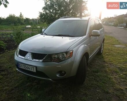 Серый Мицубиси Аутлендер ХЛ, объемом двигателя 2.4 л и пробегом 188 тыс. км за 9200 $, фото 5 на Automoto.ua