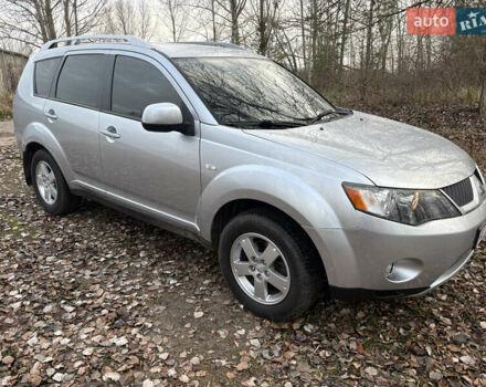 Серый Мицубиси Аутлендер ХЛ, объемом двигателя 2.36 л и пробегом 250 тыс. км за 7900 $, фото 7 на Automoto.ua
