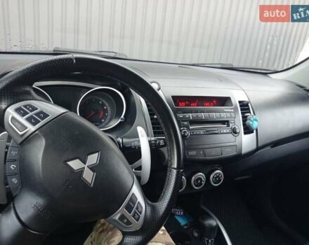 Серый Мицубиси Аутлендер ХЛ, объемом двигателя 2.4 л и пробегом 188 тыс. км за 9200 $, фото 23 на Automoto.ua
