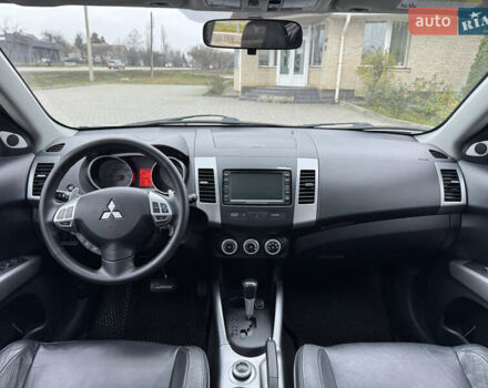 Серый Мицубиси Аутлендер ХЛ, объемом двигателя 3 л и пробегом 195 тыс. км за 10300 $, фото 12 на Automoto.ua