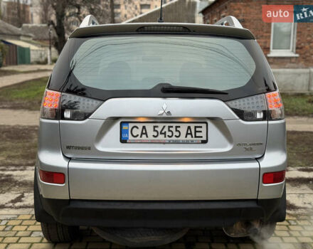 Серый Мицубиси Аутлендер ХЛ, объемом двигателя 2.4 л и пробегом 241 тыс. км за 7350 $, фото 4 на Automoto.ua