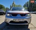 Серый Мицубиси Аутлендер ХЛ, объемом двигателя 2.4 л и пробегом 176 тыс. км за 8000 $, фото 1 на Automoto.ua