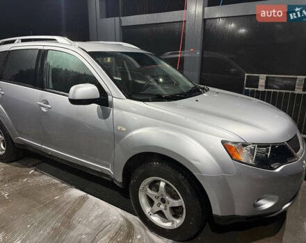 Серый Мицубиси Аутлендер ХЛ, объемом двигателя 2.36 л и пробегом 208 тыс. км за 7800 $, фото 5 на Automoto.ua