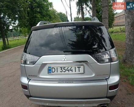Серый Мицубиси Аутлендер ХЛ, объемом двигателя 2.4 л и пробегом 188 тыс. км за 9200 $, фото 25 на Automoto.ua