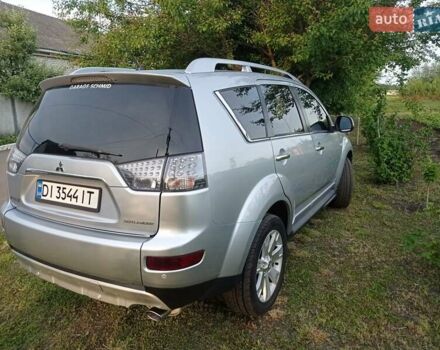 Серый Мицубиси Аутлендер ХЛ, объемом двигателя 2.4 л и пробегом 188 тыс. км за 9200 $, фото 7 на Automoto.ua