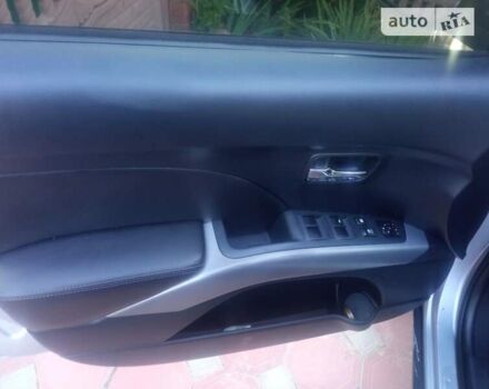 Серый Мицубиси Аутлендер ХЛ, объемом двигателя 2.36 л и пробегом 248 тыс. км за 7100 $, фото 6 на Automoto.ua