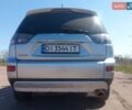 Серый Мицубиси Аутлендер ХЛ, объемом двигателя 2.4 л и пробегом 188 тыс. км за 9200 $, фото 11 на Automoto.ua