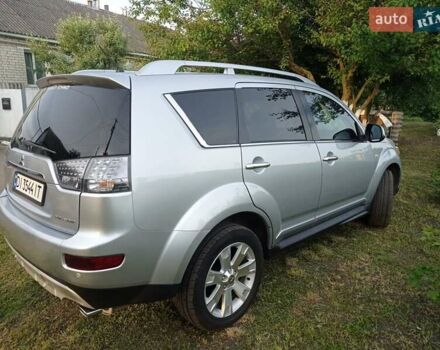 Серый Мицубиси Аутлендер ХЛ, объемом двигателя 2.4 л и пробегом 188 тыс. км за 9200 $, фото 6 на Automoto.ua