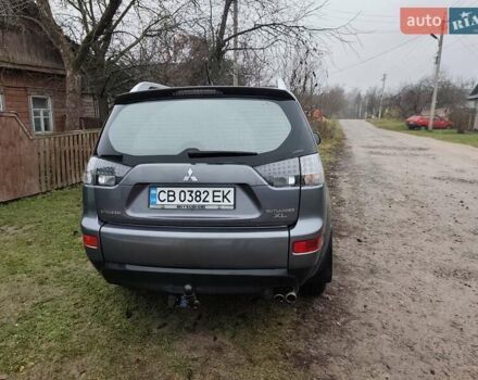 Серый Мицубиси Аутлендер ХЛ, объемом двигателя 2.98 л и пробегом 290 тыс. км за 7000 $, фото 5 на Automoto.ua