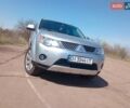 Серый Мицубиси Аутлендер ХЛ, объемом двигателя 2.4 л и пробегом 188 тыс. км за 9200 $, фото 8 на Automoto.ua