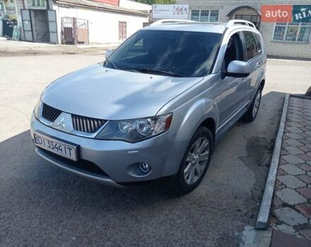 Серый Мицубиси Аутлендер ХЛ, объемом двигателя 2.4 л и пробегом 188 тыс. км за 9200 $, фото 26 на Automoto.ua