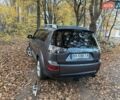 Серый Мицубиси Аутлендер ХЛ, объемом двигателя 2 л и пробегом 260 тыс. км за 8700 $, фото 5 на Automoto.ua