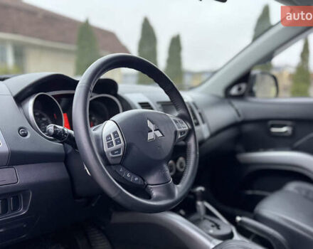 Серый Мицубиси Аутлендер ХЛ, объемом двигателя 3 л и пробегом 195 тыс. км за 10300 $, фото 10 на Automoto.ua