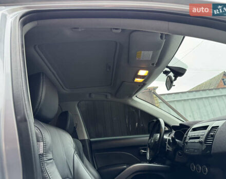 Серый Мицубиси Аутлендер ХЛ, объемом двигателя 3 л и пробегом 83 тыс. км за 13500 $, фото 79 на Automoto.ua