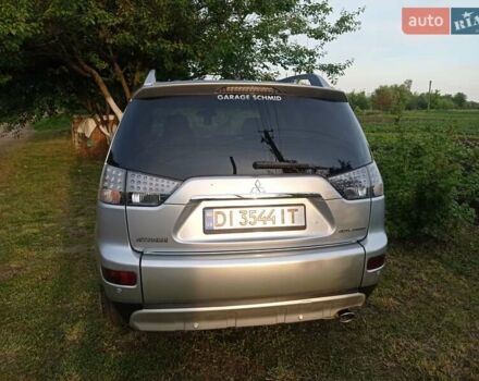 Серый Мицубиси Аутлендер ХЛ, объемом двигателя 2.4 л и пробегом 188 тыс. км за 9200 $, фото 3 на Automoto.ua