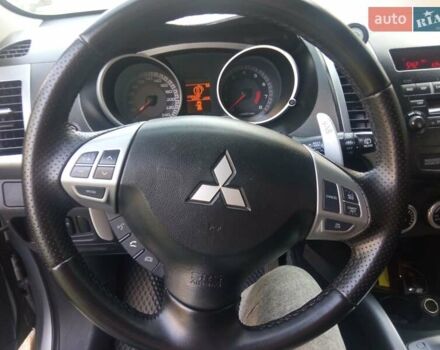 Серый Мицубиси Аутлендер ХЛ, объемом двигателя 2.4 л и пробегом 188 тыс. км за 9200 $, фото 16 на Automoto.ua