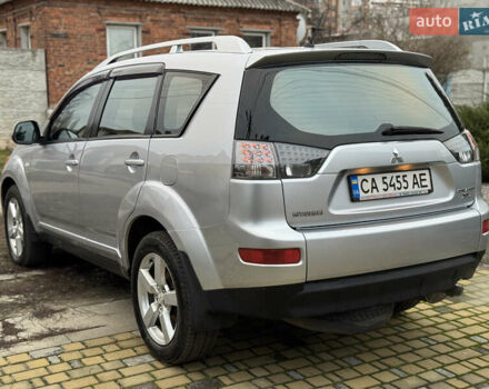 Серый Мицубиси Аутлендер ХЛ, объемом двигателя 2.4 л и пробегом 241 тыс. км за 7350 $, фото 3 на Automoto.ua