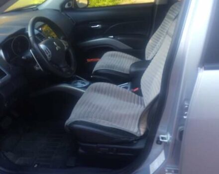 Серый Мицубиси Аутлендер ХЛ, объемом двигателя 2.36 л и пробегом 248 тыс. км за 7100 $, фото 5 на Automoto.ua