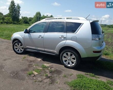 Серый Мицубиси Аутлендер ХЛ, объемом двигателя 2.4 л и пробегом 188 тыс. км за 9200 $, фото 22 на Automoto.ua
