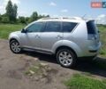 Серый Мицубиси Аутлендер ХЛ, объемом двигателя 2.4 л и пробегом 188 тыс. км за 9200 $, фото 22 на Automoto.ua