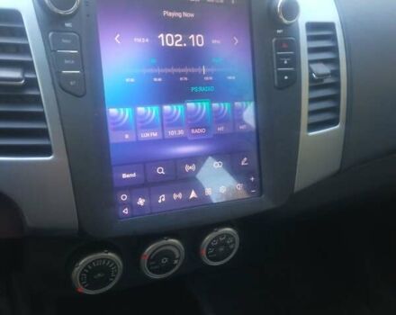 Серый Мицубиси Аутлендер ХЛ, объемом двигателя 2.36 л и пробегом 248 тыс. км за 7100 $, фото 3 на Automoto.ua