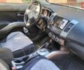 Серый Мицубиси Аутлендер ХЛ, объемом двигателя 2.36 л и пробегом 61 тыс. км за 9900 $, фото 4 на Automoto.ua