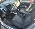 Серый Мицубиси Аутлендер ХЛ, объемом двигателя 2.4 л и пробегом 191 тыс. км за 9700 $, фото 12 на Automoto.ua