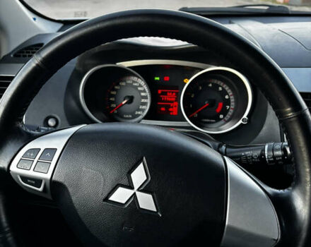 Серый Мицубиси Аутлендер ХЛ, объемом двигателя 2.36 л и пробегом 177 тыс. км за 8750 $, фото 49 на Automoto.ua