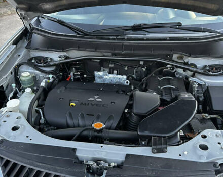 Серый Мицубиси Аутлендер ХЛ, объемом двигателя 2.36 л и пробегом 177 тыс. км за 8750 $, фото 37 на Automoto.ua