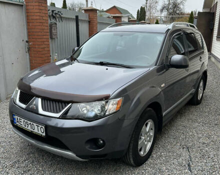 Серый Мицубиси Аутлендер ХЛ, объемом двигателя 2.36 л и пробегом 153 тыс. км за 11500 $, фото 1 на Automoto.ua