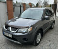 Серый Мицубиси Аутлендер ХЛ, объемом двигателя 2.36 л и пробегом 153 тыс. км за 11500 $, фото 1 на Automoto.ua