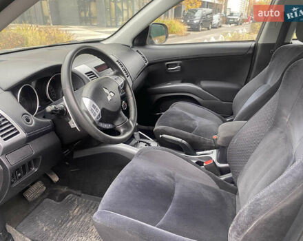 Серый Мицубиси Аутлендер ХЛ, объемом двигателя 2.4 л и пробегом 182 тыс. км за 9800 $, фото 18 на Automoto.ua