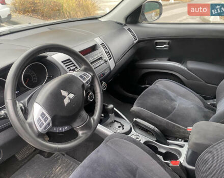 Серый Мицубиси Аутлендер ХЛ, объемом двигателя 2.4 л и пробегом 182 тыс. км за 9800 $, фото 19 на Automoto.ua