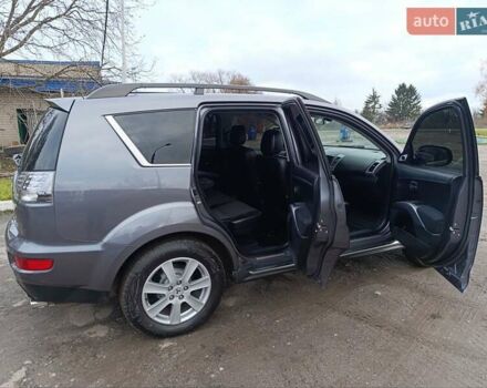 Серый Мицубиси Аутлендер ХЛ, объемом двигателя 2.3 л и пробегом 289 тыс. км за 10333 $, фото 13 на Automoto.ua