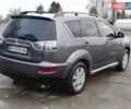 Серый Мицубиси Аутлендер ХЛ, объемом двигателя 2.3 л и пробегом 289 тыс. км за 10333 $, фото 2 на Automoto.ua