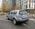 Серый Мицубиси Аутлендер ХЛ, объемом двигателя 2.4 л и пробегом 182 тыс. км за 9800 $, фото 7 на Automoto.ua